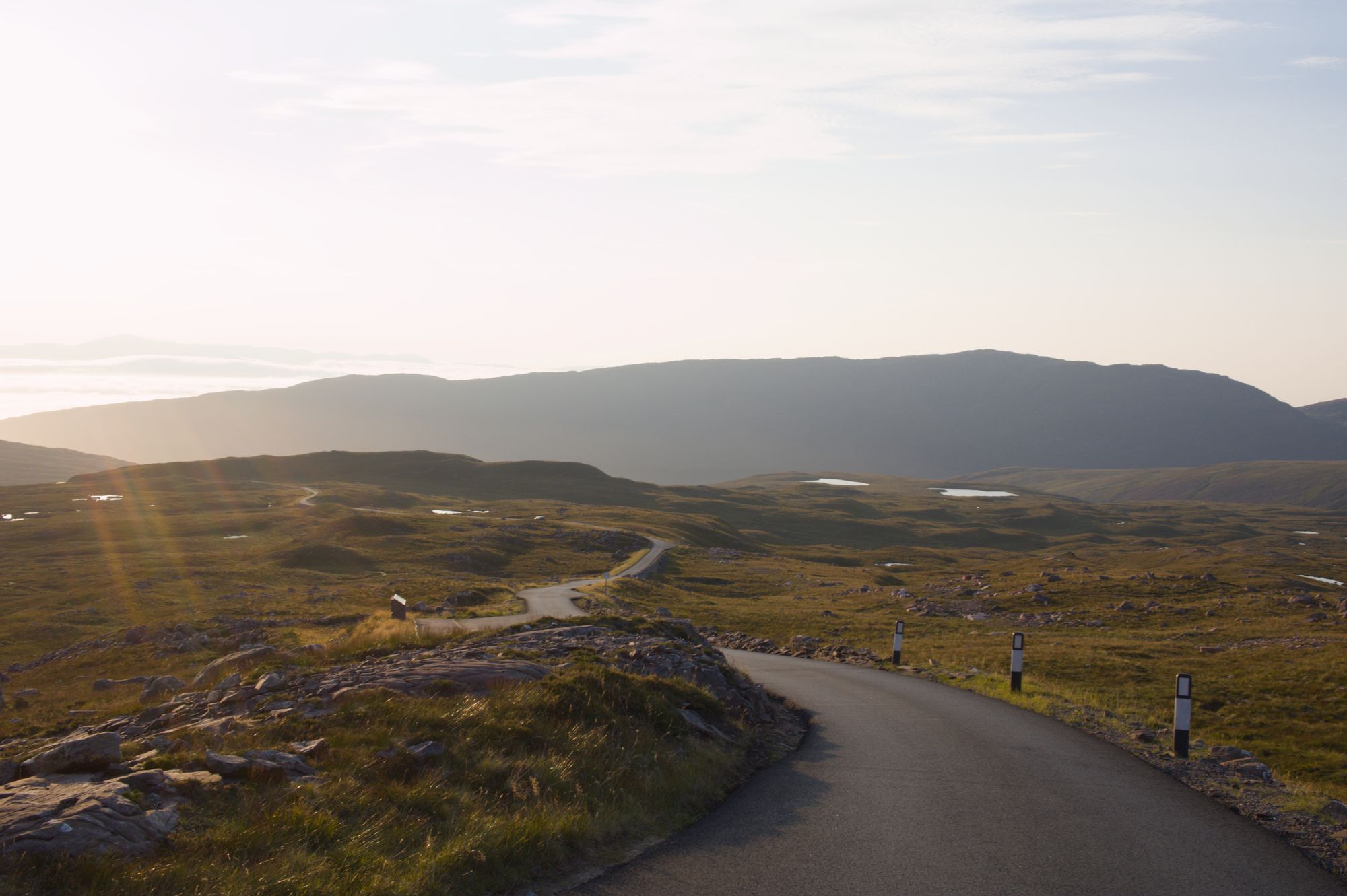 Rural winding roads passing through the Scottish Highlands